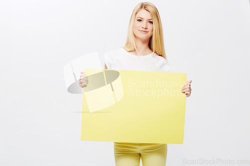 Image of Woman, portrait and placard or mockup billboard in studio or poster or recommendation, communication or white background. Female person, face and blank paper or news bulletin, message or announcement