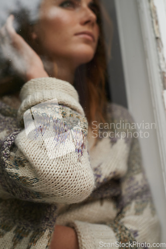 Image of Woman, thinking and ideas by window of home for relax, lonely and wondering with mental health on weekend. Person, thoughtful and sad with depression, contemplation and daydreaming in apartment