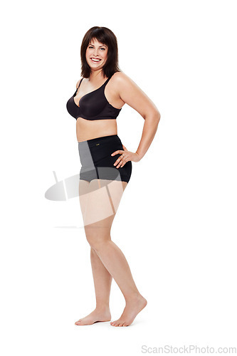 Image of Portrait, happy and plus size woman in underwear in studio isolated on a white background mockup space. Smile of person, model and body positivity, self acceptance and confidence in natural beauty