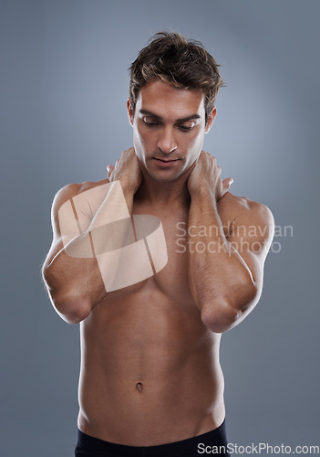 Image of Thinking, skincare and man with cosmetics, shirtless and dermatology on a grey studio background. Person, thoughts and model with wellness and muscular with health and grooming with shine or body