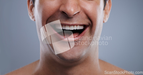 Image of Man, mouth and laughing with face and lips with hygiene, jawline and satisfaction with treatment closeup. Grooming, confidence and skincare with male model in studio background for cosmetics