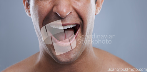 Image of Man, mouth and clean shave with laughing, lips and hygiene with jawline, satisfaction and treatment closeup. Grooming, confidence and face with male model in studio background for cosmetic smile