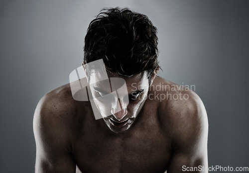 Image of Thinking, skincare and man with cosmetics, dermatology and wellness on a grey studio background. Person, thoughts and model with grooming and morning routine with healthy skin and beauty with shine