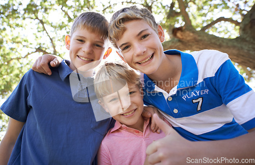 Image of Friends, brothers and hugging in outdoor portrait, children and care in childhood or smiling. Happy siblings, embrace and satisfaction for fun adventure, love and relaxing on vacation or holiday