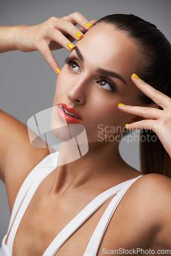 Image of Face, beauty and thinking with manicure woman in studio isolated on gray background for cosmetology. Makeup, lipstick and cosmetics with confident young model closeup for luxury or colorful nails