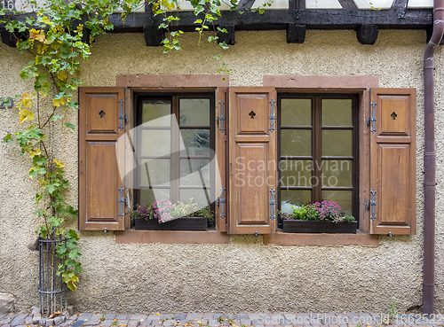Image of house facade with historic windows