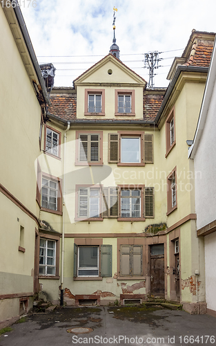 Image of rundown house facade