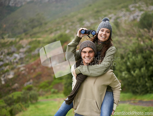 Image of Hiking portrait, binocular or happy couple on piggyback ride, have fun and enjoy mountain climbing journey in nature. Marriage, love or people bond on travel adventure, trekking or bird watching trip