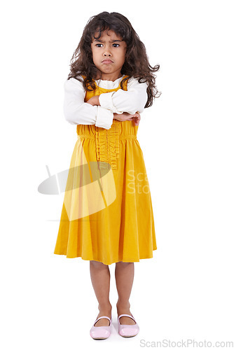 Image of Girl, kid and angry with arms crossed, mad and expression isolated on a white studio background. Model, mockup space and child with emoji and upset with reaction, unhappy and frustrated with decision