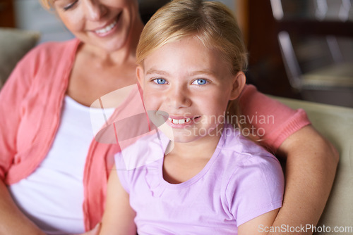 Image of Mother, girl and relaxing on couch in portrait, bonding and love in childhood by single parent at home. Daughter, mommy and caring together in living room, embrace and security or enjoying connection