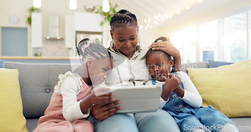 Image of Happy, mother with her child and tablet on sofa in living room of their home together. Technology or connectivity, happiness or kissing and black family on couch streaming a movie in their house