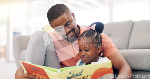 Image of Reading, father and story with girl for learning in lounge for education or quality time. Kid, books and parent for support on floor or fun with growth for childhood at house with happy family.