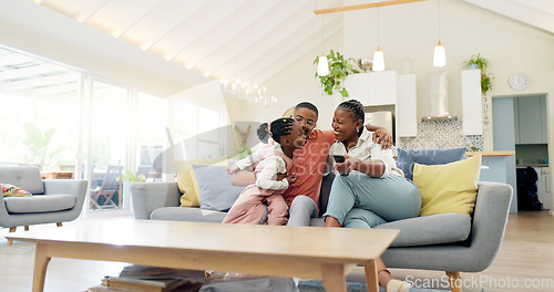 Image of Support, black family on sofa and in living room of their home happy together smiling. Support or care, happiness or bonding time and African people cuddle on couch in their house for positivity