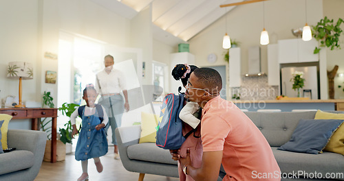 Image of Father, hug and student after school with love and support in a home feeling happy. House, living room and dad with children and youth with a family and young kids together with papa and parent care