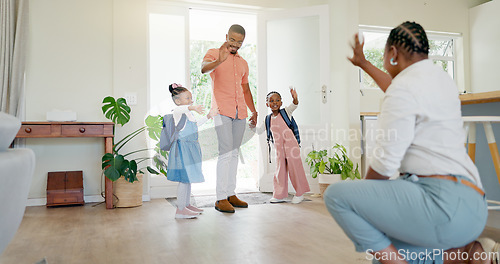 Image of Black family, mother and wave at kids going to school with love, care or affection. Goodbye, parents and girls leaving house for kindergarten, learning or education in the morning with father in home