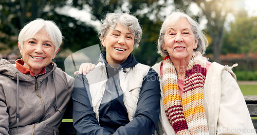 Image of Senior, women and friends laugh in park with face and retirement smile in a garden. Nature, portrait and hug with elderly female people on vacation in woods feeling happy from bonding and freedom