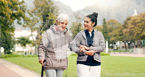 Image of Senior woman, walker and nurse outdoor in a park with healthcare for elderly exercise. Walking, healthcare professional and female person with peace and physical therapy in a public garden with carer