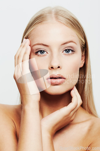 Image of Woman, portrait and hands on skin for beauty, natural cosmetics and glamour on white background. Clean face skincare and dermatology with makeup, wellness and facial for treatment for makeover