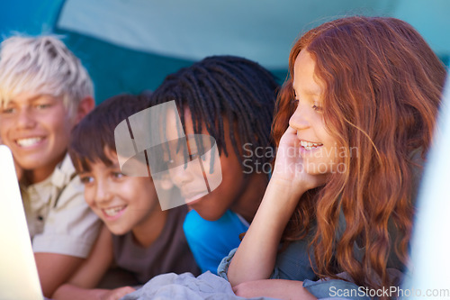 Image of Children, relax and watch laptop on floor together with cartoon, movie or online games on holiday or vacation. Kids, smile and playing with computer on website, streaming or search on internet