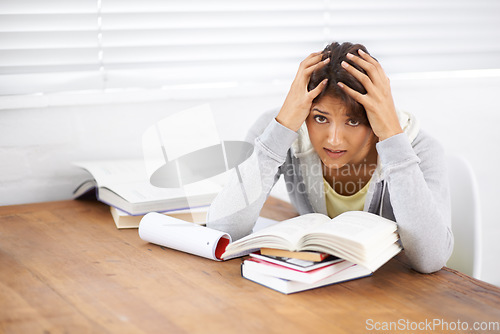 Image of Student, woman and frustrated with studying or books for knowledge and education with notes in bedroom..Young person, girl and portrait at desk or confused for scholarship, project and assessment