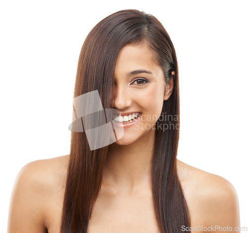 Image of Hair care, smile and portrait of woman in studio for cosmetic, salon and beauty treatment. Happy, confident and young female person with healthy and shiny hairstyle routine by white background.