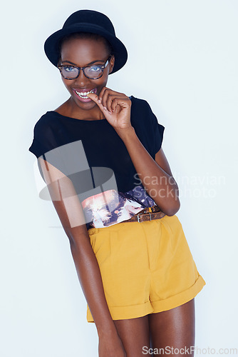 Image of Portrait, funny and black woman with fashion, glasses and stylish clothes on a white studio background. African person, girl and model with eyewear and casual outfit with gen z and goofy with fun