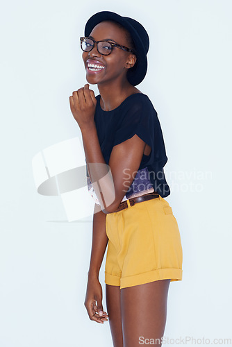 Image of Fashion, beauty and portrait of African woman on a white background in trendy, stylish and casual clothes. Confidence, hipster style and isolated person with smile, glasses and happiness in studio