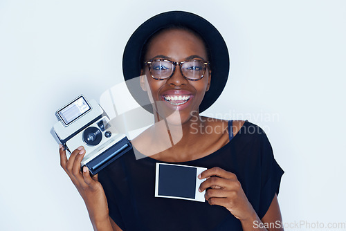 Image of Black woman, photograph and portrait in studio with camera, creativity and media for artist with creative talent. Young person, happiness and face for photoshoot, lens and focus by white background