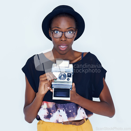 Image of Woman, picture and camera in studio with shock, creativity and vintage in photography for media art. African person, surprise and face in creative production and photoshoot image by white background