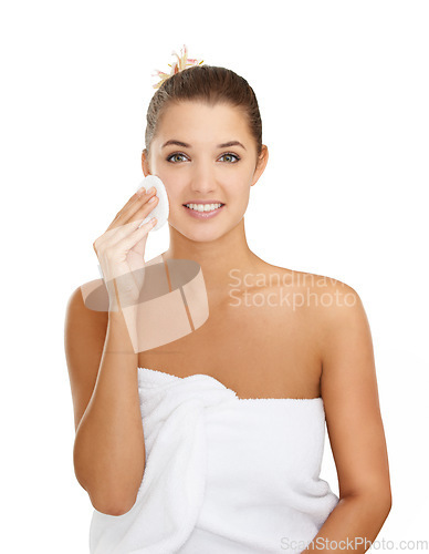 Image of Skincare, portrait or woman with cotton pad in studio for wellness, shine or glow on white background. Cleaning, face or model with facial swab for makeup, removal to after shower toner application