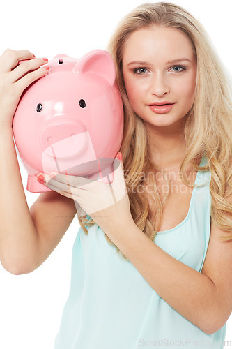 Image of Woman, piggy bank and finance or portrait in studio with cash investment, financial growth or wealth. Person, money box and budget or banking for increase or income on white background with smile