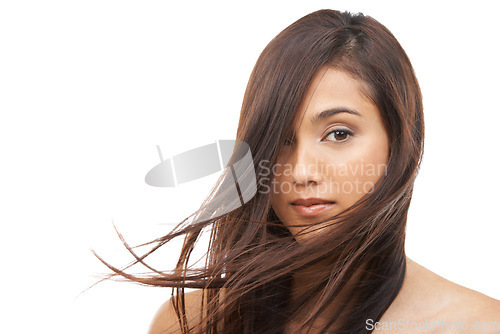 Image of Hair care, woman and portrait or cosmetics in studio with keratin treatment, soft texture and shampoo shine. Model, Indian person and face with mockup, beauty and collagen glow on white background