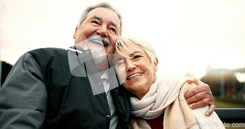 Image of Retirement, hug and Senior couple on bench at park with happiness or bond for quality time. Love, happy face and elderly woman or man in nature with support or embrace for trust or laugh together.