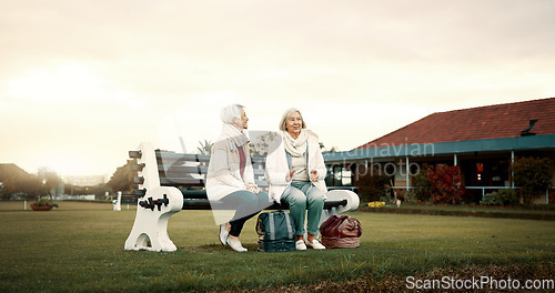 Image of Talking, senior friends and at a club for sports, fitness break and sitting together after exercise. Happy, relax and elderly women on a field bench for conversation, retirement hobby or activity