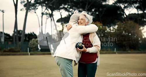 Image of Bowling success, hug and women on a field with teamwork, support and celebration in sport. Happy, win and senior friends excited about a game or competition in a park for retirement hobby together