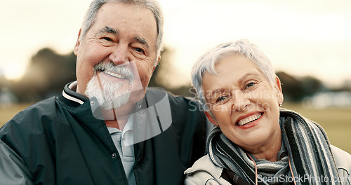 Image of Face, smile and happy with a senior couple outdoor in a park together for a romantic date during retirement. Portrait, love or care with an elderly man and woman bonding in a garden for romance