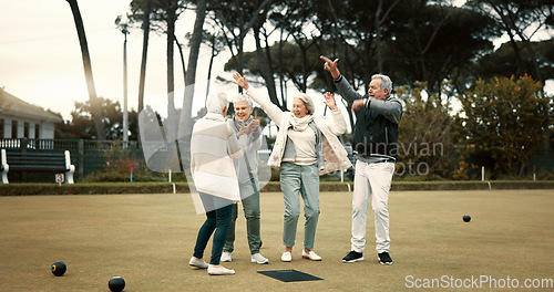 Image of Bowls, celebration and hugging with senior friends outdoor, cheering together during a game. Motivation, support or applause and a group of elderly people clapping while having fun with a hobby