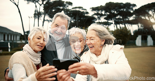 Image of Senior people, happy or friends take a selfie in park together for a memory with smile or joy outdoors. Group, old man or elderly women taking photo or picture in nature for social media for vlogging