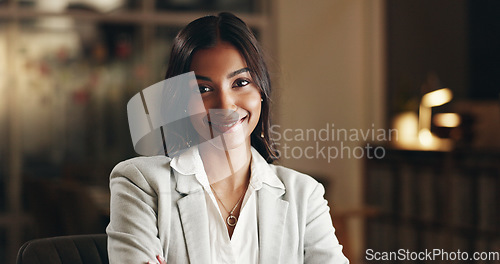 Image of Smile, night and face of business woman, office consultant or agent happy for overtime work, commitment or career. Pride, portrait and Indian person confident, professional and working late in agency