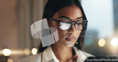 Image of Tablet, overtime and happy woman in office with glasses, reflection with planning and website. Vision, smile and businesswoman typing email, late at night work and research on future ideas for agency