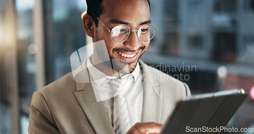 Image of Office tablet, face and happy man typing, scroll or check research data, planning or reading customer experience analytics. Night report, feedback review and media analyst work on project statistics