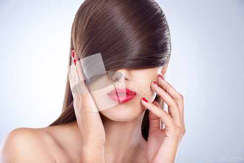 Image of Face, hair and hands of woman with manicure in studio on white background for keratin treatment. Beauty, salon and nails with confident young haircare model for shampoo, cosmetics or hairdressing