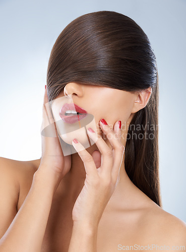 Image of Hair, salon and nails of woman with manicure in studio on white background for keratin treatment. Face, beauty and hands with confident young haircare model for shampoo, cosmetics or hairdressing