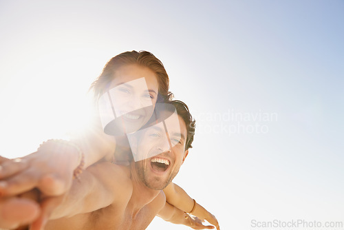 Image of Happy couple, portrait and piggyback in support with blue sky at beach in love, care or enjoying outdoor holiday weekend. Face of man and woman smile for fun embrace, trust or hug in summer on mockup