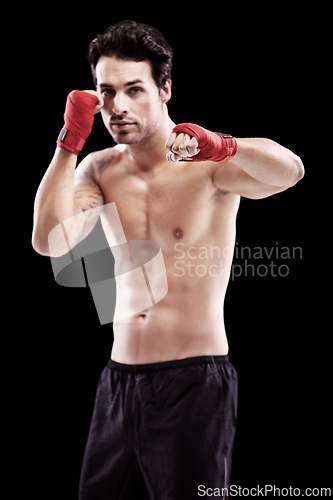 Image of Man, portrait and fitness with boxer fist in a studio with boxing training and workout. Body, athlete and male fighter from Brazil with exercise, sport and wellness for battle with black background