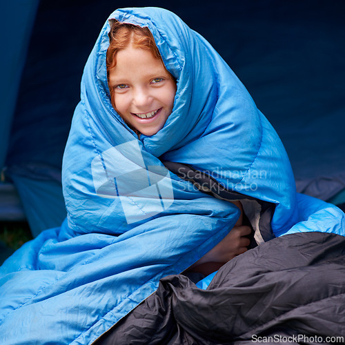 Image of Happy, camping and portrait of child in sleeping bag for resting, relax and comfortable in tent. Travel gear, youth and girl in sleep sack for adventure on holiday, vacation and weekend outdoors