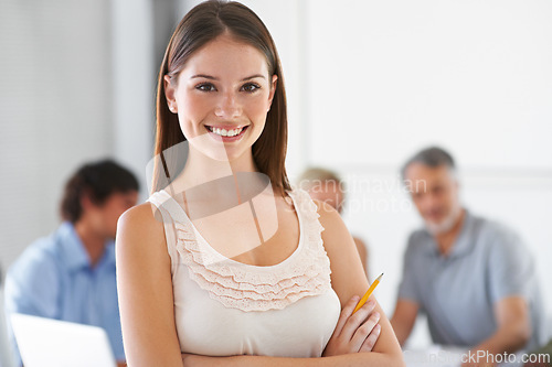 Image of Portrait, arms crossed or happy woman in meeting with designers for planning or discussion. Confidence, teamwork or group of professional business people in collaboration, working on creative project