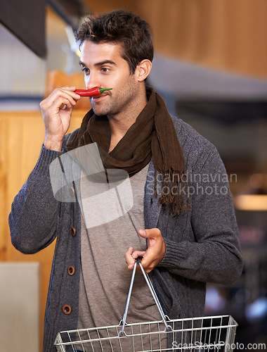 Image of Pepper, smell or man shopping at a supermarket for grocery promotions, sale or discounts deal. Chilli, check or customer buying groceries for healthy nutrition, organic vegetables or diet for choice