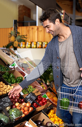 Image of Vegetables, food or happy man shopping at a supermarket for grocery promotions, sale or discounts deal. Check, choice or customer buying groceries for healthy nutrition, fresh organic produce or diet