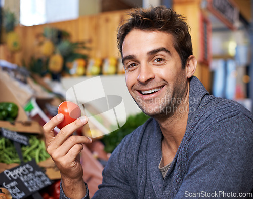 Image of Tomato, portrait or happy man shopping at a supermarket for grocery promotions, sale or discounts deal. Smile, retail or customer buying groceries for healthy nutrition, organic vegetables or food